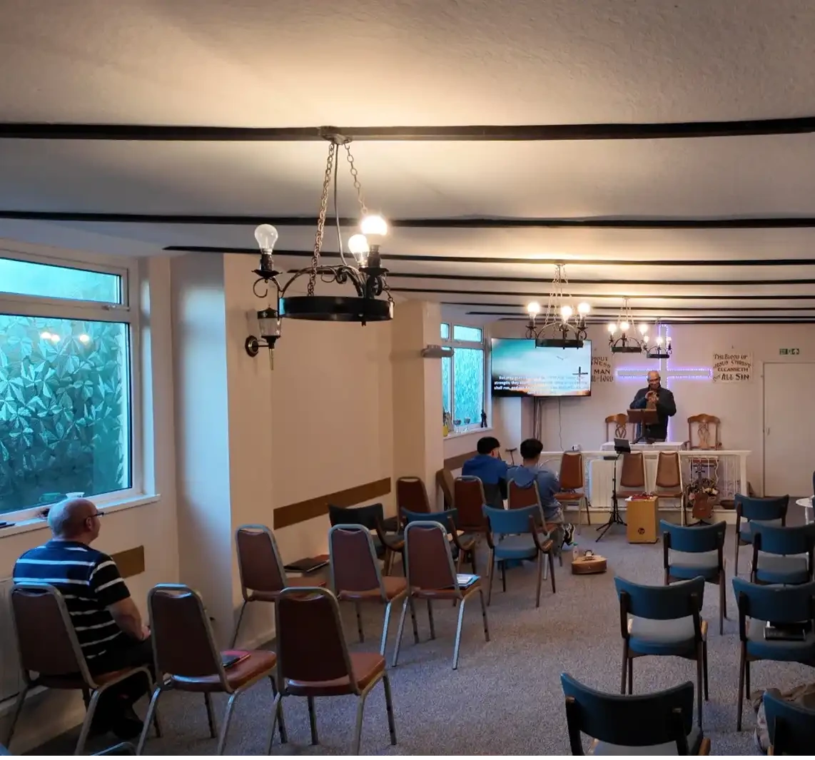 Gus_preaching.webp